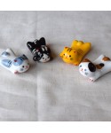 chopsticks laying cat